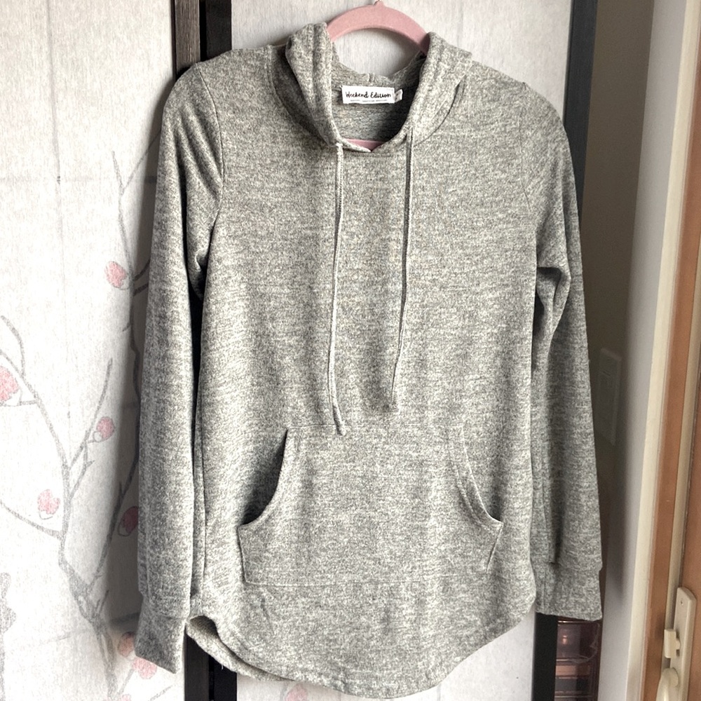 Grey rounded hemline hoodie in size M